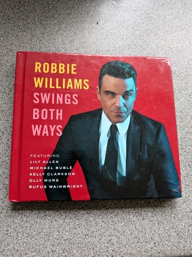 Robbie williams swings both - robbie,